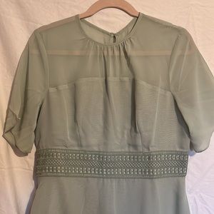 Sage green short sleeve dress.